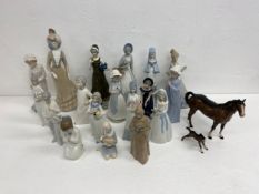 A collection of twenty mid-century and later Spanish porcelain figures to include Tengra, Nao and