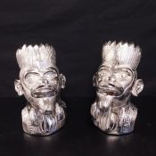 A pair of chrome ice buckets in the form of monkey DJ's. 35 x 20 x 27cm