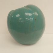 A large turquoise glazed terracotta apple. H.36 Dia 34cm