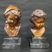 A pair of Continental cold painted bronze figural busts, portraits of children, raised on square