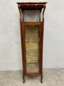 A late 19th century mahogany vitrine in the Art Nouveau style. H.136 W.41 D.40cm.