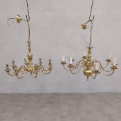 A brass eight branch chandelier and a similar Dutch style example. H.82 Dia.67cm. H.100 Dia.78cm.