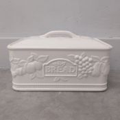 A vintage white glazed ceramic lidded bread bin. H.21 W.35 D.21cm