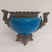 A 19th century gilt metal mounted Chinoiserie faience jardinière with everted openwork rim over