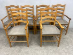 A set of six oak Lancashire ladderback dining armchairs with grey calico upholstered seats. H.107