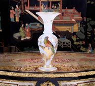 ATTRIBUTED TO BACCARAT: A RARE MID 19TH CENTURY OPALINE GLASS VASE DECORATED WITH EXOTIC BIRDS