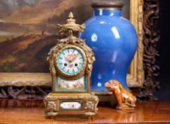 A FINE MID 19TH CENTURY FRENCH ORMOLU AND PORCELAIN MOUNTED MANTEL CLOCK