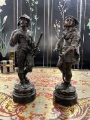 A PAIR OF 19TH CENTURY BRONZE FIGURES OF A NATIVE WARRIOR AND FRENCH SOLDIER