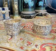 AN EARLY 20TH CENTURY STERLING SILVER JUG AND SUGAR BASKET