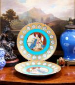 A LARGE PAIR OF LOUIS XVI STYLE SEVRES STYLE PORCELAIN CHARGERS