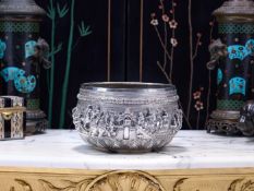A LARGE EARLY 20TH CENTURY BURMESE SILVER BOWL