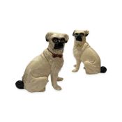 A PAIR OF GLAZED CERAMIC MODELS OF PUG DOGS