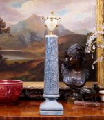 A 19TH CENTURY GRAND TOUR MODEL OF A CLASSICAL URN ON STAND