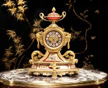 A LATE 19TH CENTURY FRENCH GILT BRONZE AND PORCELAIN MOUNTED MANTEL CLOCK