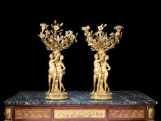 A FINE PAIR OF EARLY 19TH CENTURY GILT BRONZE CANDEALBRA AFTER FALCONET