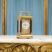 CHARLES FRODSHAM: A GILT BRASS CARRIAGE CLOCK