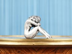 AN ITALIAN SILVER MODEL OF A NUDE GIRL