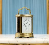 A LARGE 19TH CENTURY FRENCH OVAL CARRIAGE CLOCK SIGNED V.R. BREVETE PARIS