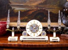 AN ART DECO PERIOD ALGERIAN ONXY AND CHAMPLEVE ENAMEL CLOCK GARNITURE