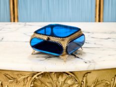 AN ORMOLU AND BLUE GLASS JEWELLERY CASKET