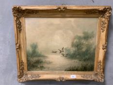 A framed 20th century oil on canvas depicting flying ducks signed Joh Schoeffer