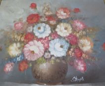 A modern gilt framed still life oil on canvas, depicting a vase of flowers, signed lower right