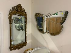 A Art deco style painted butterfly mirror together with a two gilt mirrors and a cream triple