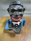 **A smiling Sam money bank**