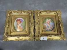 Two small ornate gilt framed oval ceramic plaques, overall 19.5 x 18 cm