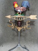 **A cast metal cockerel weather vane**