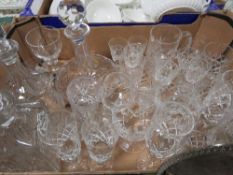 A tray of glassware to include decanters and various drinking glasses comprising mainly crystal and