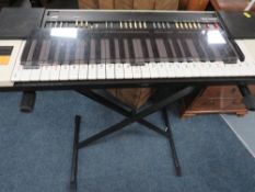 A vintage JVC kb 500 Keyboard and stand