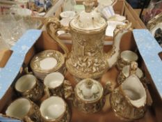 An ornate Capodimonte coffee set
