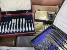 A tray of assorted cased flatware sets