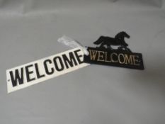 **Two Welcome signs**