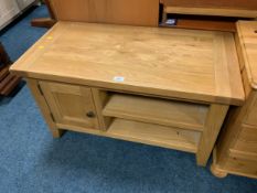 A modern oak media cabinet W 90 cm together with a Colonial style coffee table. (2)