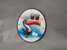 **A round Guinness toucan sign**
