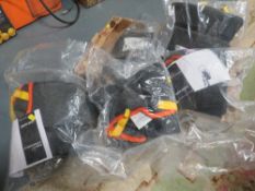 A tray of new old stock patient lift harnesses