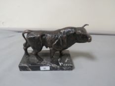 **A bull figure on marble base**