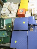 Four trays of boxed Lilliput Lane cottages (unchecked) together with a tray of royal books etc