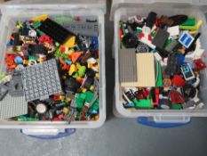A large quantity of Lego in two plastic containers