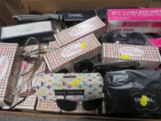 A mixed box of sunglasses