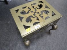 A brass trivet