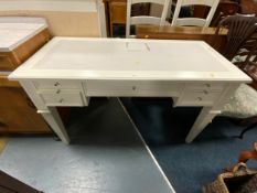 A modern white desk W 130 cm. A/F