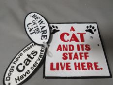 **Three cat signs**