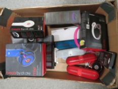 A tray of electricals to include portable speaker and beats headphones