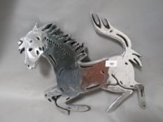 **An aluminium prancing horse sign**