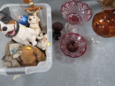A tray of assorted animal resin figures together with a tray of glass
