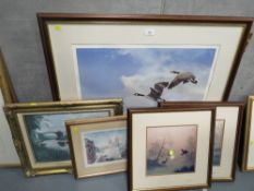 A large limited edition print of Canada Geese, signed by artist ?? Hodges 893/950, together with a