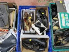 Three trays of assorted boxed shoes and handbags